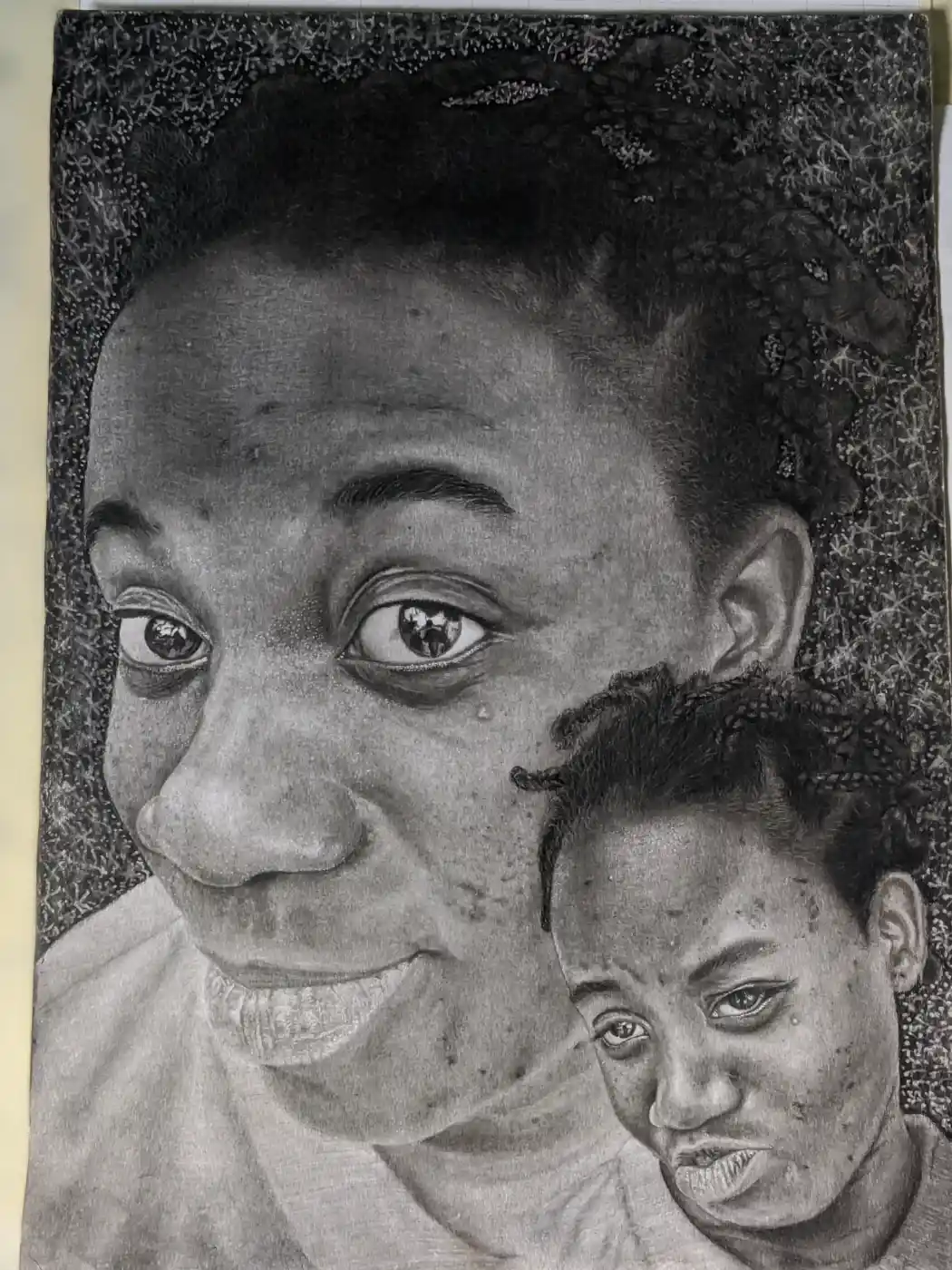 Dual Portrait in Charcoal and graphite