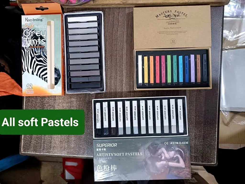 Assorted Soft Pastels and Charcoal Sticks